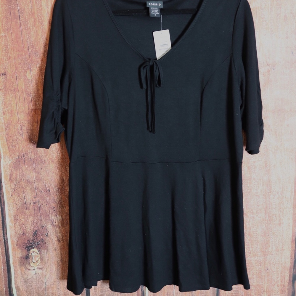 Torrid peplum top.